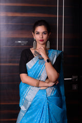 Blue silver chanderi sari is a handwoven Sari with silver zari water drop buttis all over the sari accompanied with a pallu with zari lines, along with a silver zari border spanning all the six yards. 